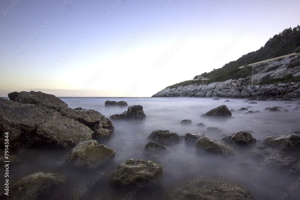Dramatic beach scene Vallcarca, Catalonia
