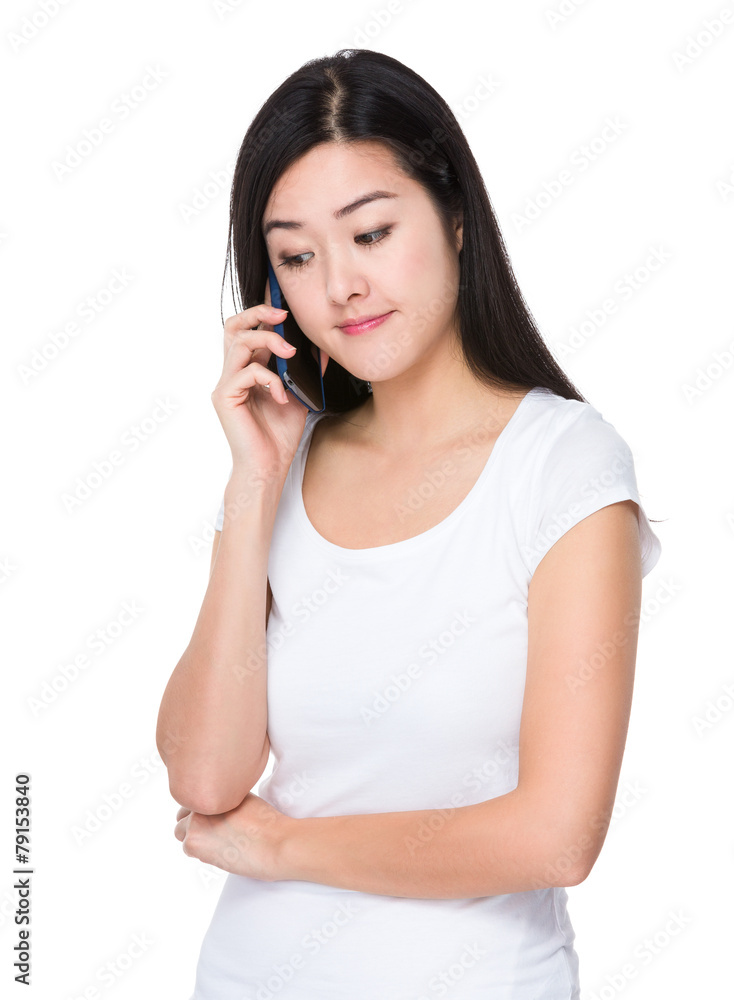 Young woman talk to mobile phone