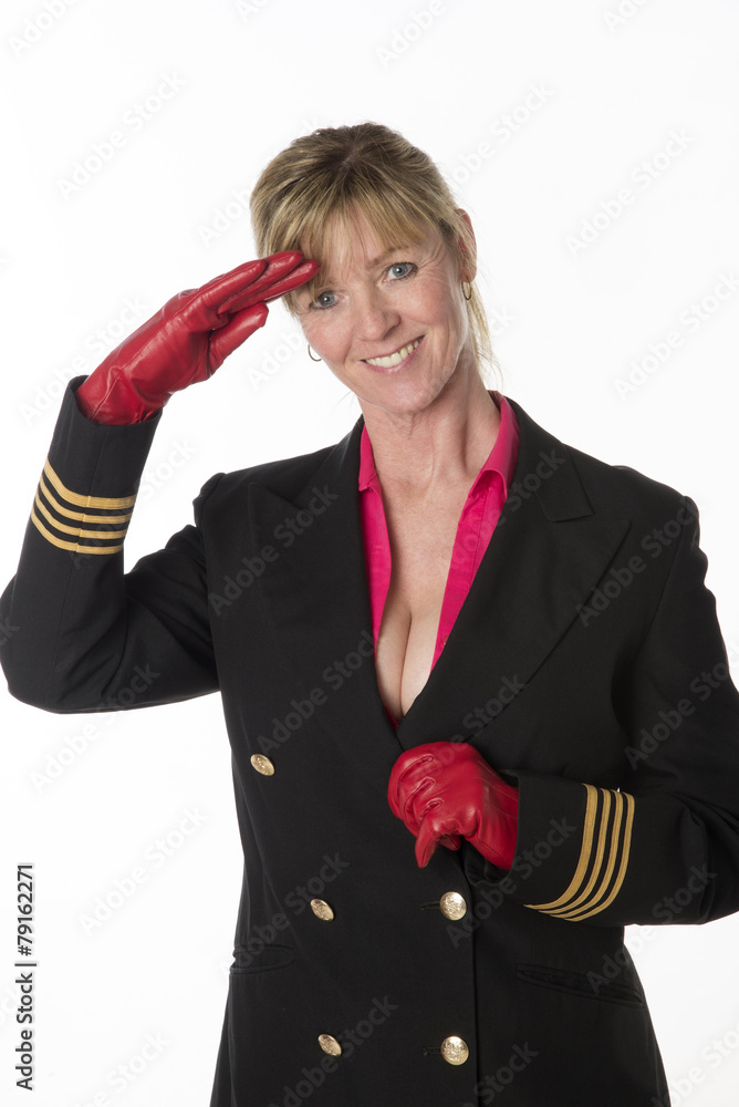 Saluting airline crew member wearing low cut uniform Saluting airline crew member wearing low cut uniform
