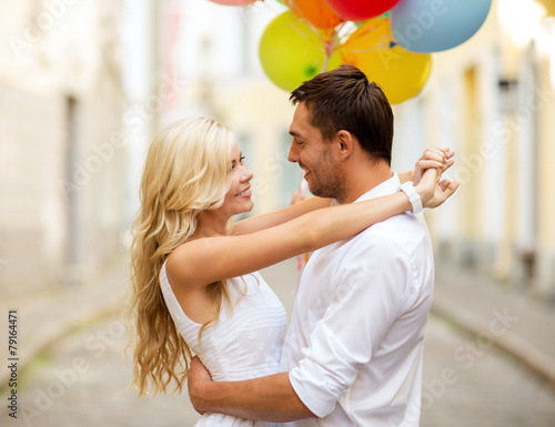 couple with colorful balloons