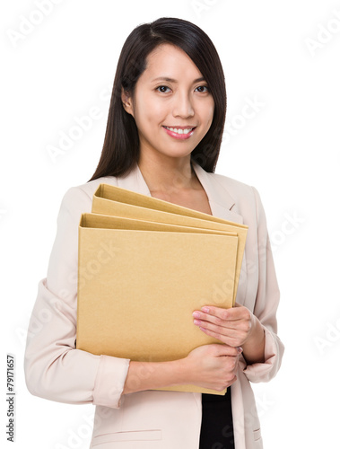 Businesswoman hold with folder © leungchopan
