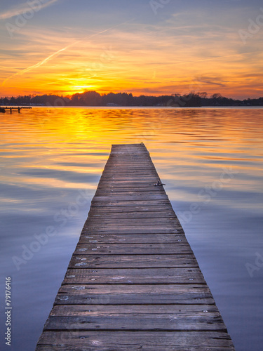 Majestic Sunset over Wooden Jetty in Groningen  Netherlands