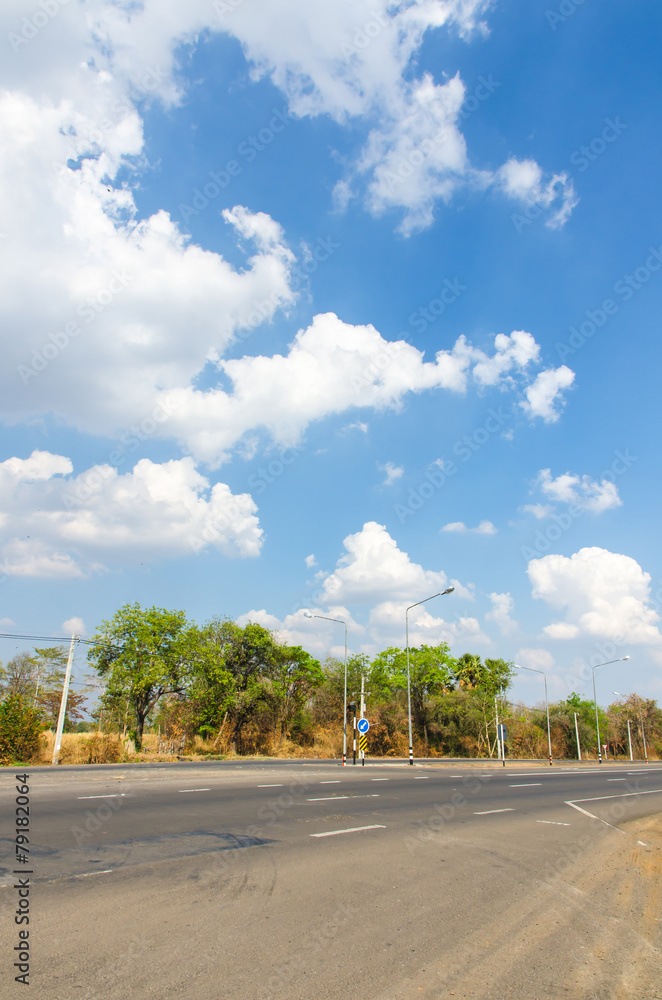 Fototapeta premium The road with cloud and blue sky