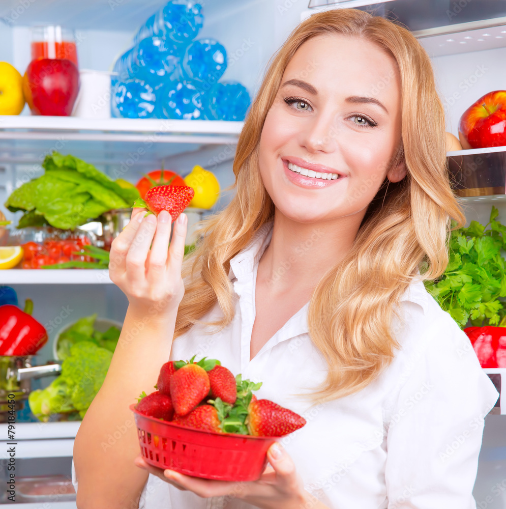 Beautiful woman eating strawberry Beautiful woman eating strawberry