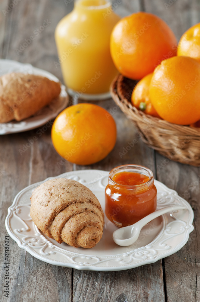 Homemade bread and orange jam Homemade bread and orange jam