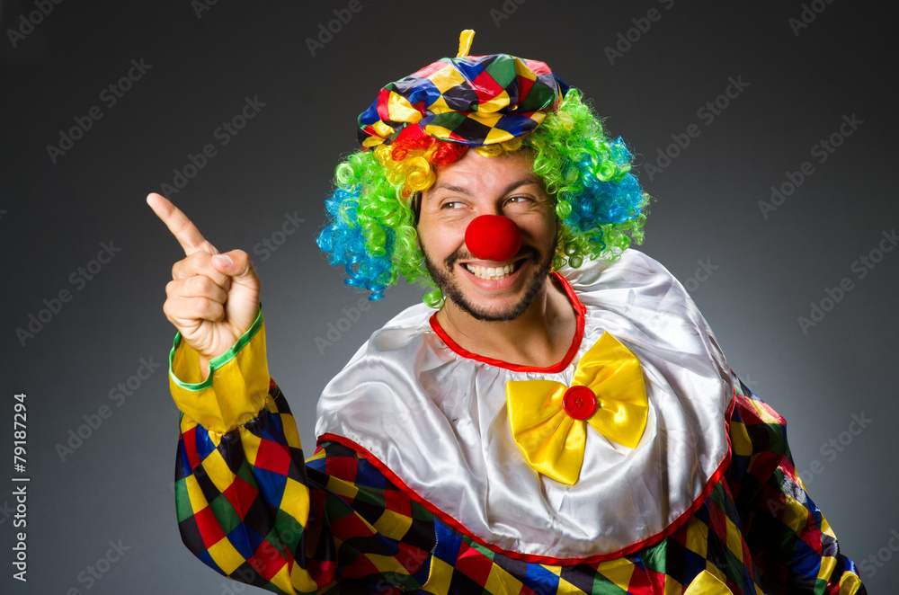 Funny clown in colourful costume Funny clown in colourful costume