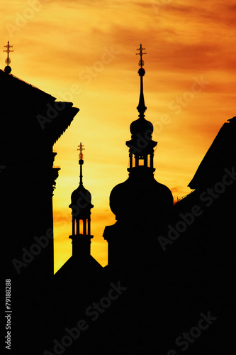 Silhouettes of the towers in the historic center of Prague at su