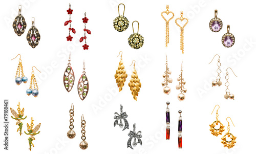 Obraz na plátně Set of various earrings isolated on white