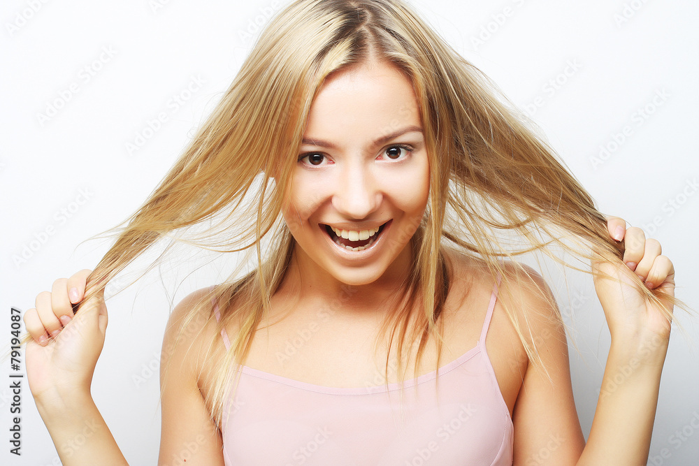 Fototapeta premium smiling beautiful young woman