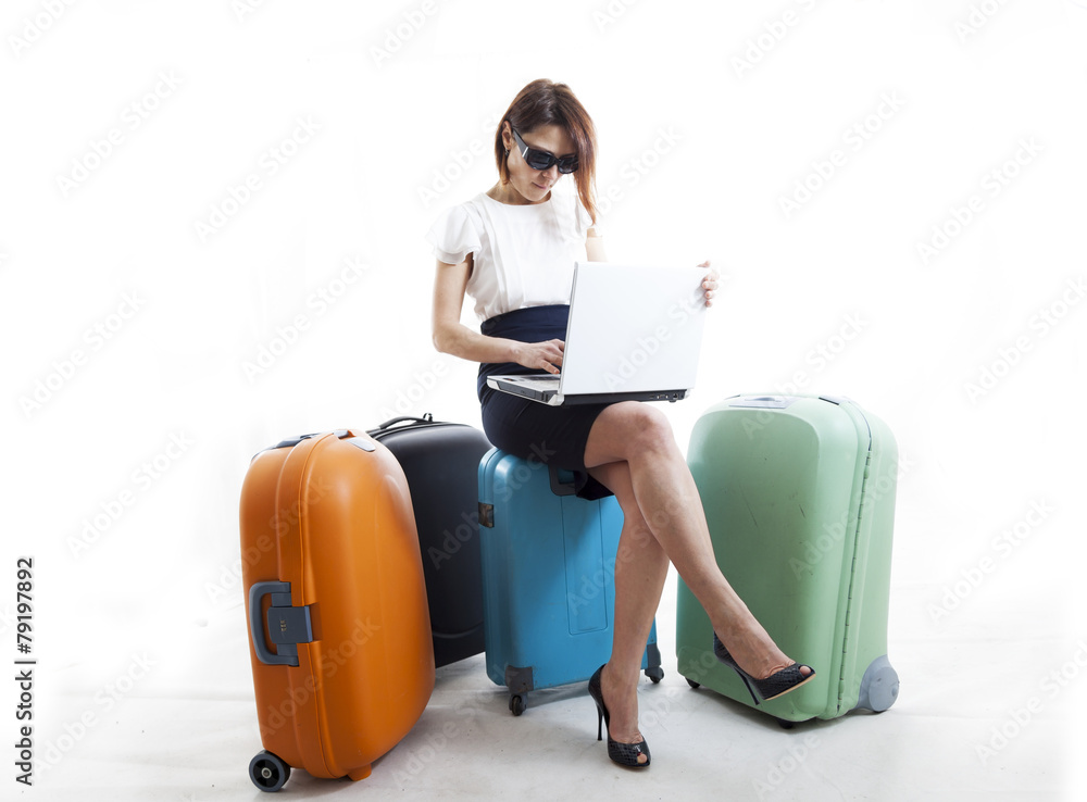 business woman with her suitcases ready to go business woman with her suitcases ready to go