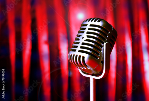 Canvas Print Retro microphone on bright curtain background