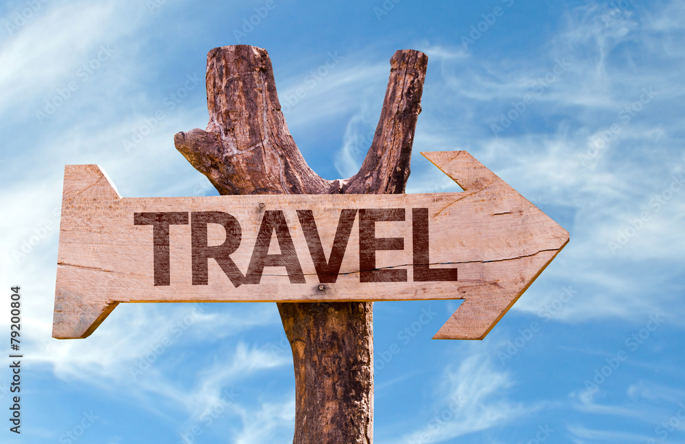 Travel wooden sign with sky background