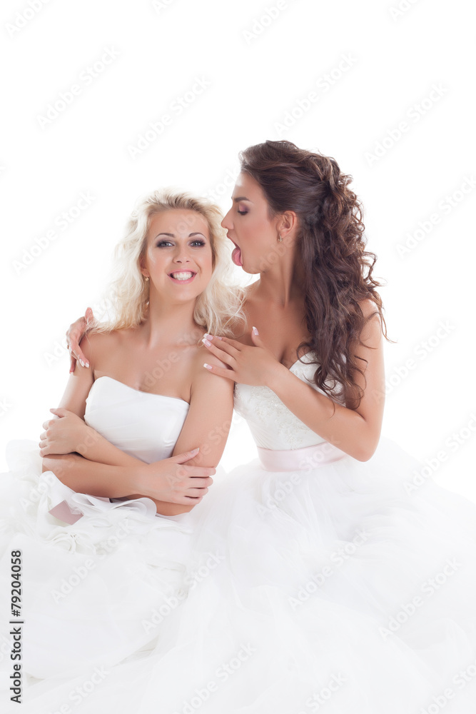 Image of cute brides fooling around at camera Image of cute brides fooling around at camera