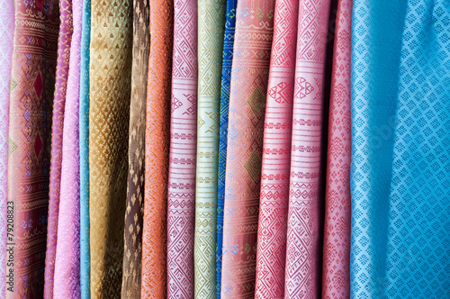 stack of traditional thai fabric, Thailand © amawasri