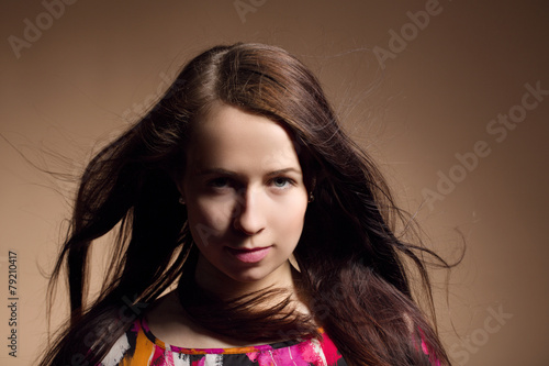 Fashion portrait of beautiful young girl