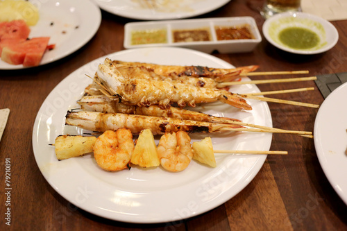 BBQ shrimp in dish.