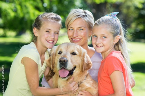 Happy family with their dog © WavebreakMediaMicro