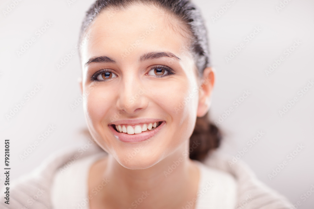Smiling woman posing on white background Smiling woman posing on white background