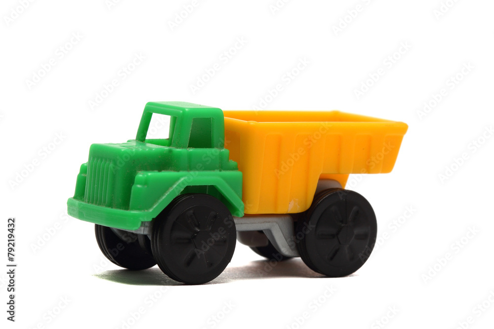 colorful toy truck on a white background close up colorful toy truck on a white background close up