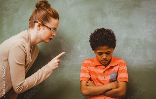Photography Teacher shouting at boy in classroom