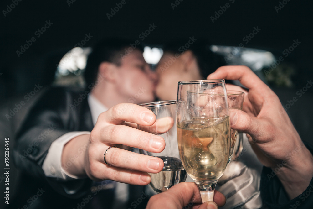 Bride and groom kissing cheers Bride and groom kissing cheers
