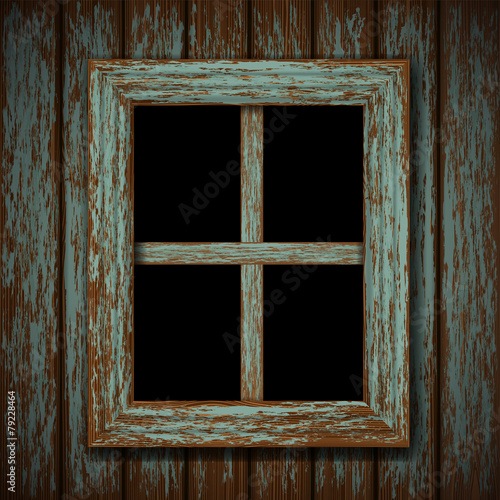 wooden window of an old abandoned building