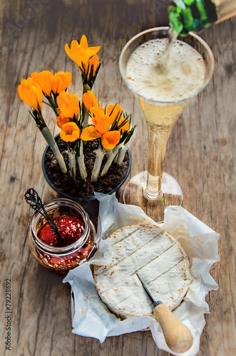 Camembert cheese, champagne, citrus jam and crocuses