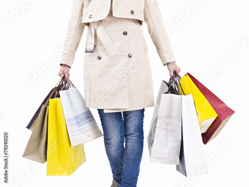 woman walking with shopping bags