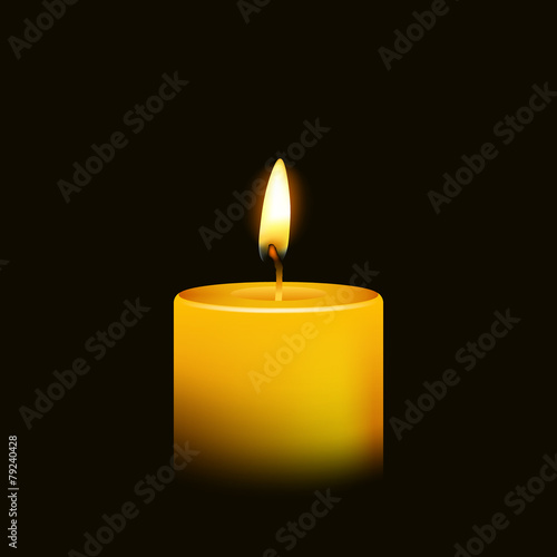 One candle flame at night closeup - isolated.