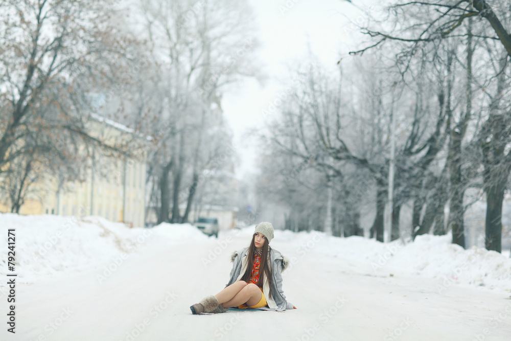glamorous winter portrait of a girl outside