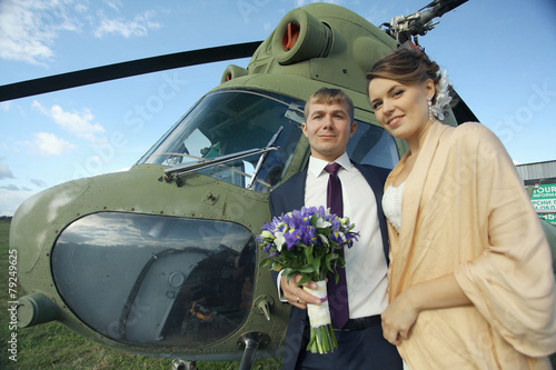 Wedding couple in love vintage aircraft photo