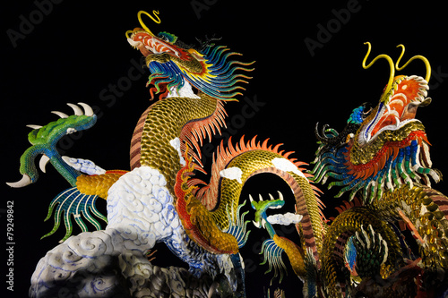 Dragon sculpture on black backgroun