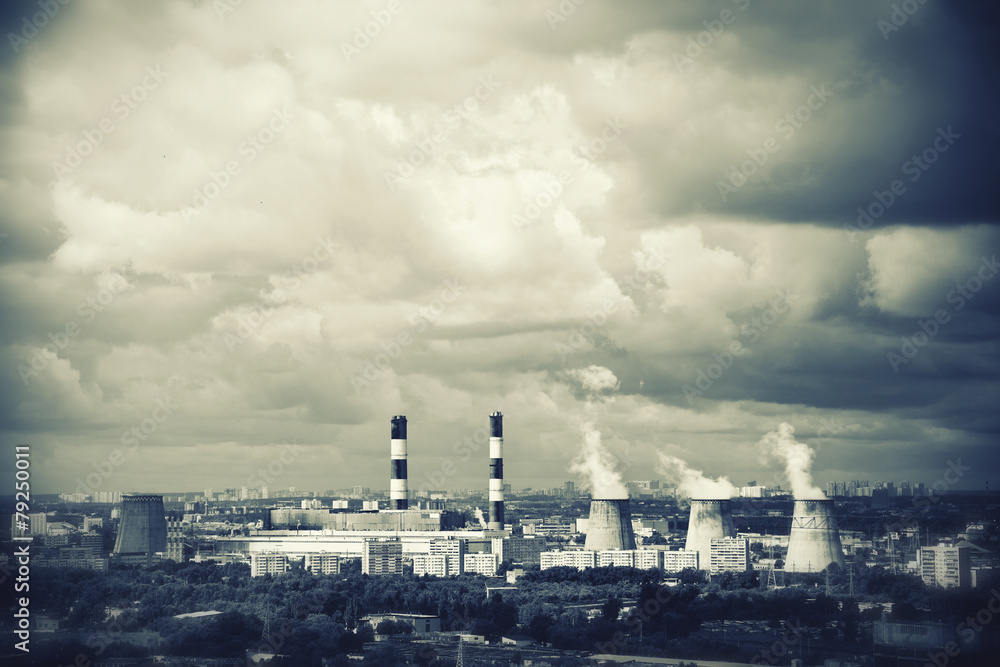 Industrial plants with smoking chimneys in the city Industrial plants with smoking chimneys in the city