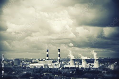 Industrial plants with smoking chimneys in the city