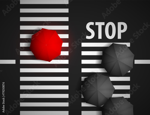 red umbrella and black umbrellas on a background of a pedestrian