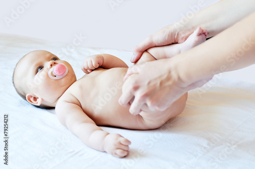 massaging of little baby