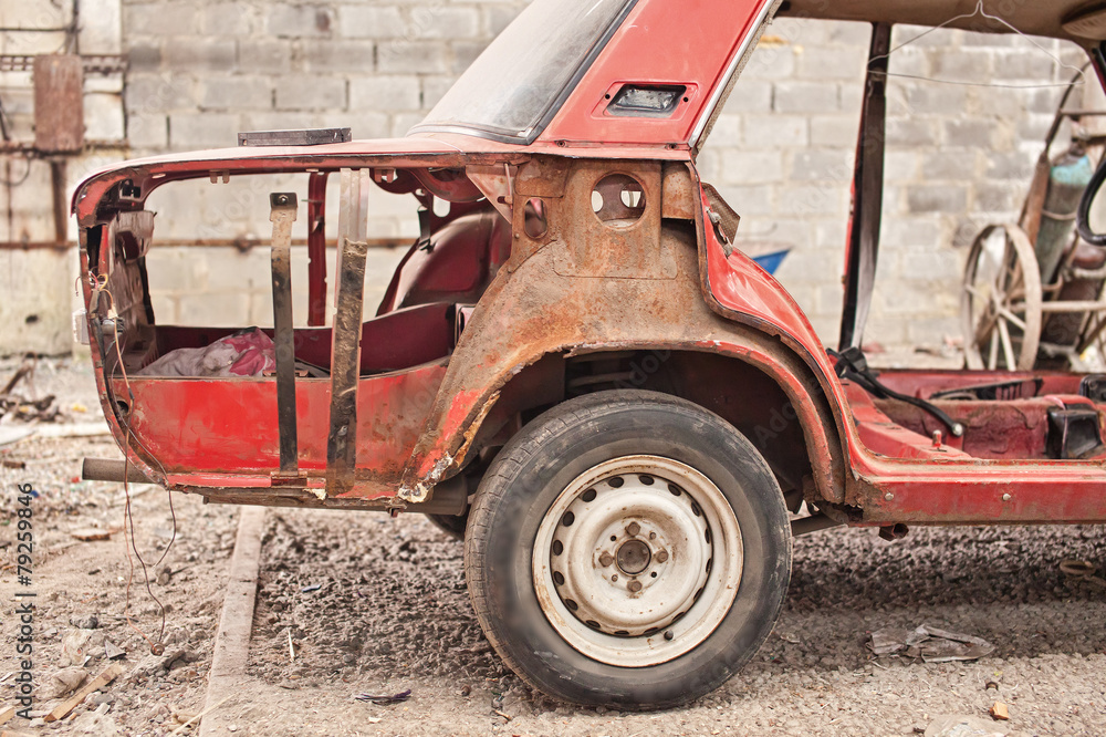 Fragment of old rusty car without doors Fragment of old rusty car without doors