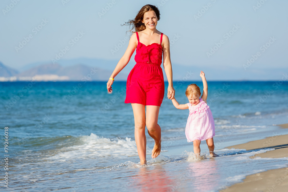 Mother and daughter on the beach Mother and daughter on the beach