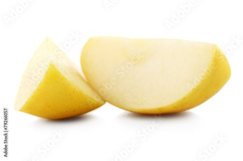 Juicy slices of apple isolated on white