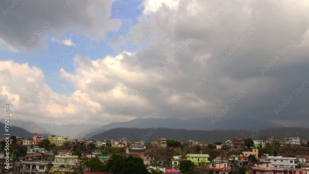 Timelapse in city of stormy clouds with mountains Timelapse in city of stormy clouds with mountains