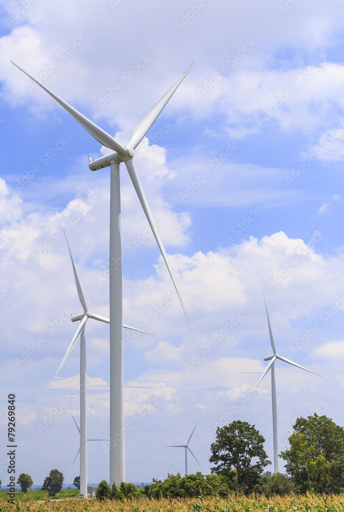 Wind Turbine for alternative energy on background blue sky . Wind Turbine for alternative energy on background blue sky .