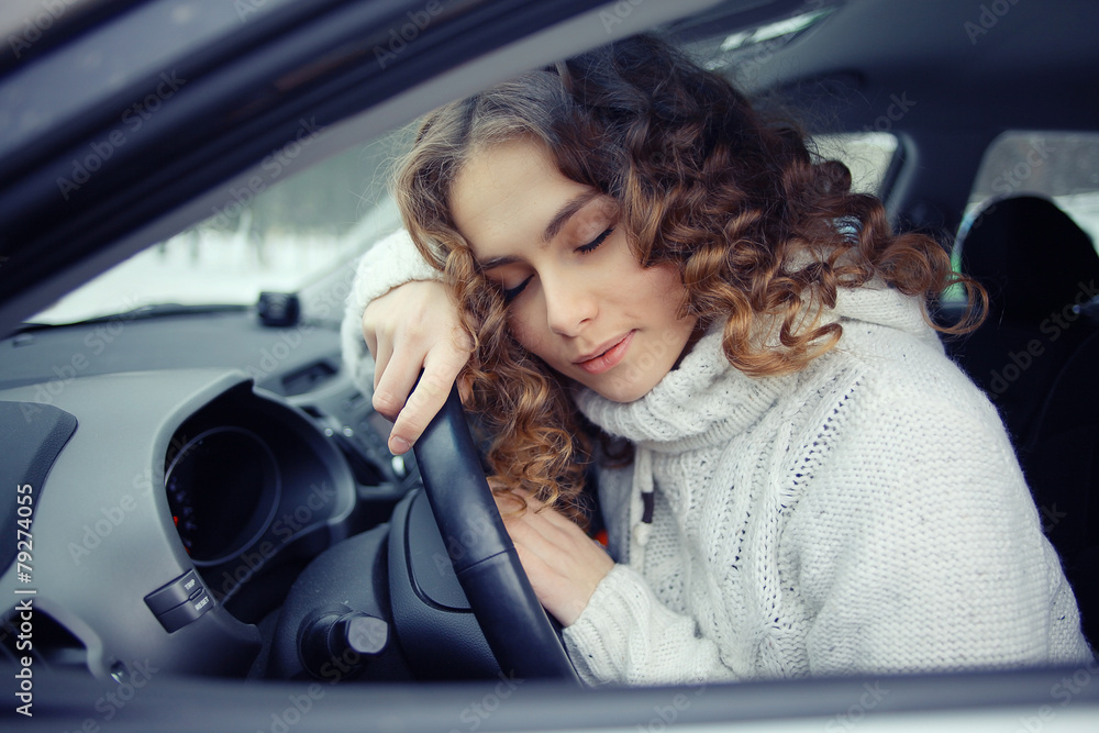 blonde behind the wheel of a portrait