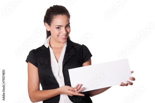 Happy young woman holds blank card - copyspace