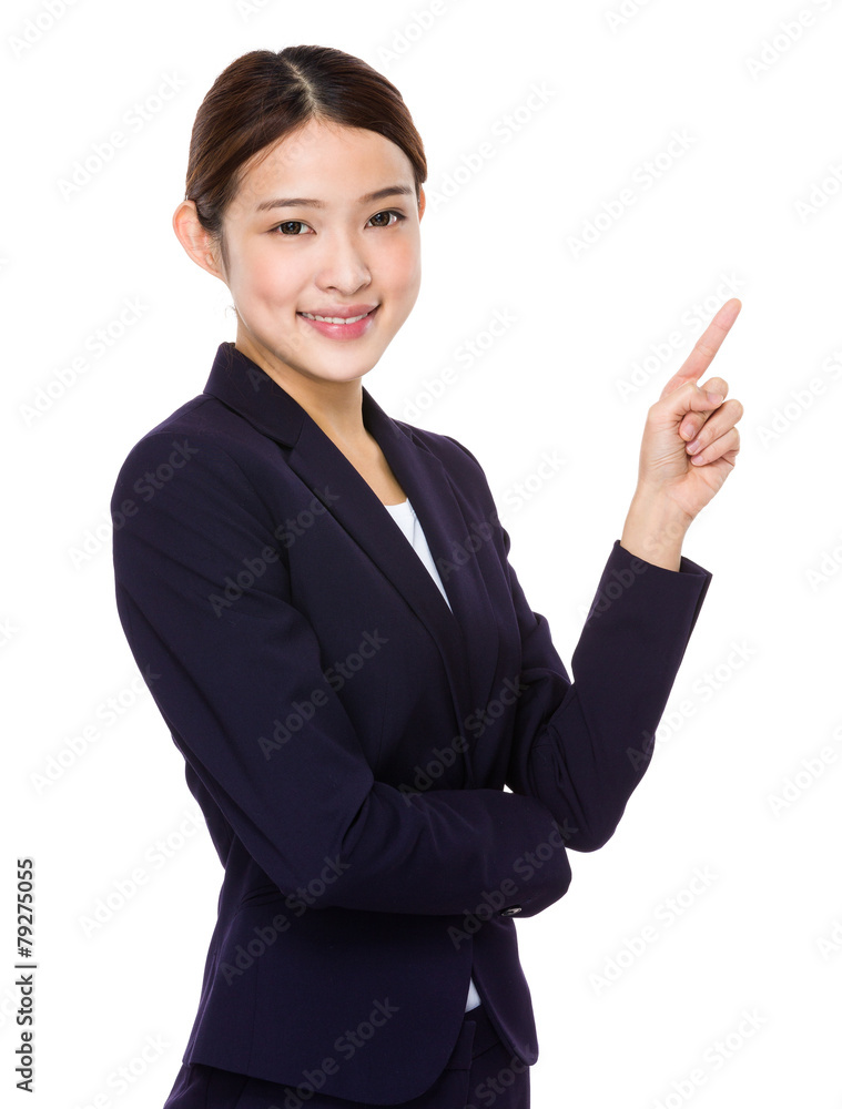 Businesswoman with finger point upwards Businesswoman with finger point upwards