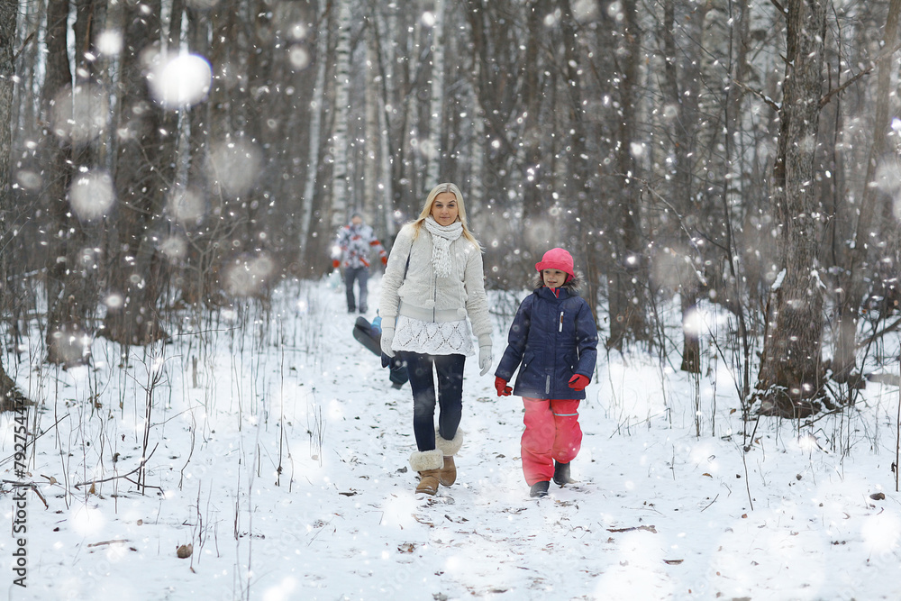 young beautiful blonde girl in winter forest young beautiful blonde girl in winter forest