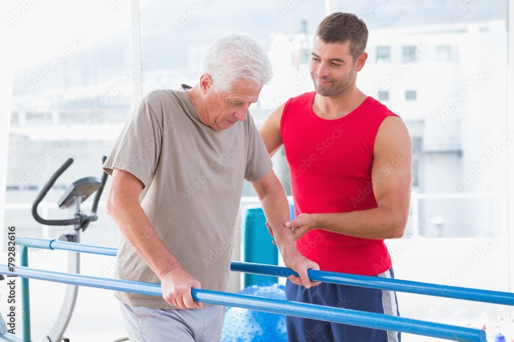 Senior man walking with coach help Senior man walking with coach help