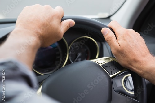 Close up of man holding his wheel