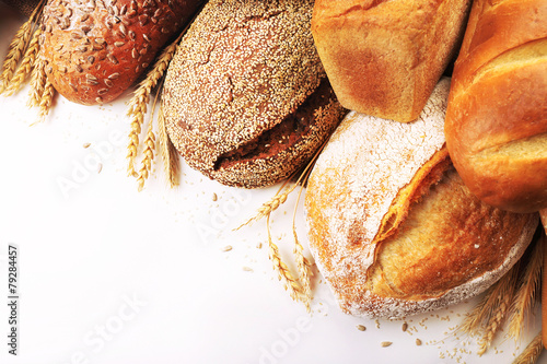 Fresh bread with wheat, sesame and sunflower seeds isolated