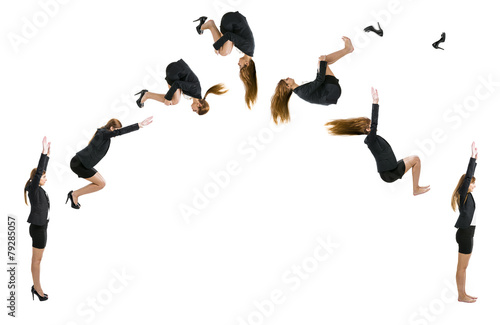 Business woman making a front flip