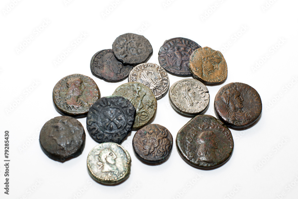Vintage  coins with portraits on a white background